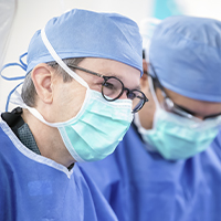 AHN physicians wearing masks during surgery