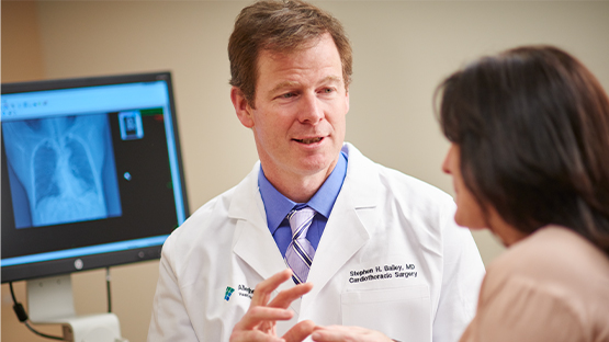 AHN physician consulting with a patient