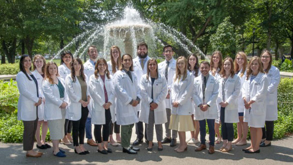 image of AHN Pharmacy Residents in front of the Northeast Fountain in Allegheny Commons Park