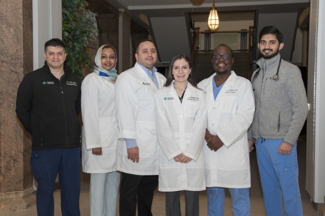 Doctors working in cadaver lab