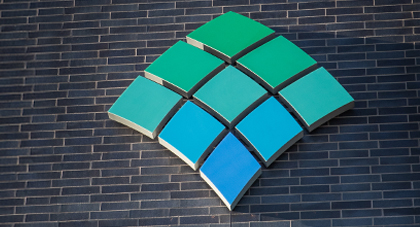 AHN logo on the side of brick building