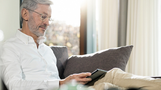 older male gentleman viewing the Colonoscopy Prep Guide on his tablet