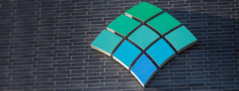 AHN logo on the side of brick building