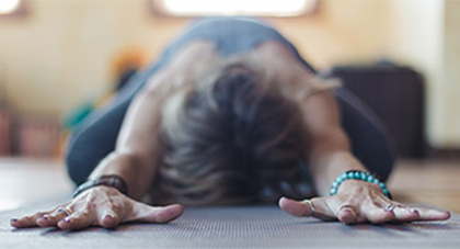 image of a woman doing yoga