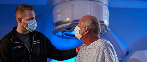 AHN nurse navigator offering comfort to a patient during his test