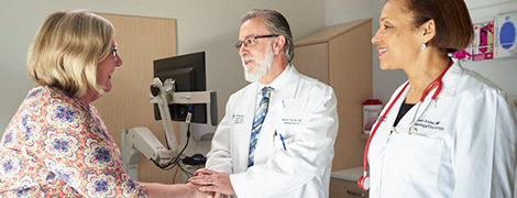 image of a patient's legs waiting to see a doctor