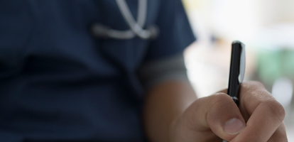 image of a doctor writing a prescription