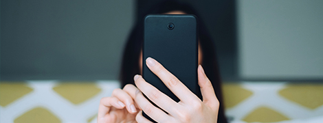 woman holding smart phone