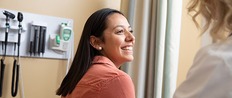 Person smiling at physician