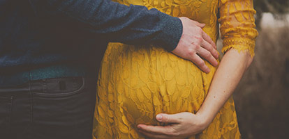 image of a women holding her baby womb