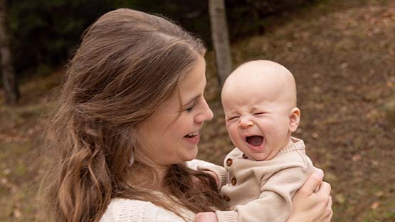AHN Wexford Hospital patient Madison Dischinger holding her newest child in her arms outside
